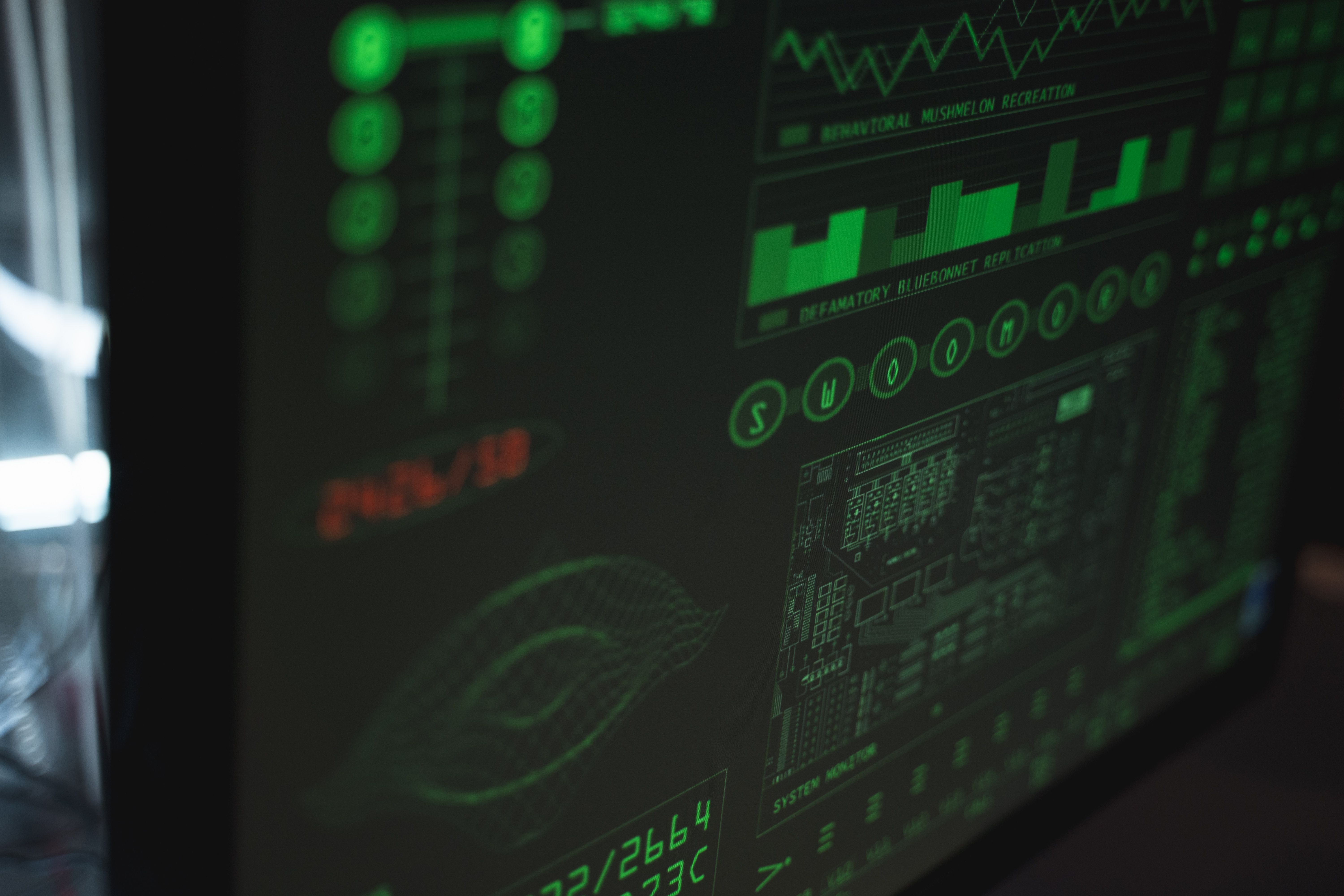 Close-up of a computer displaying cybersecurity and data protection interfaces
