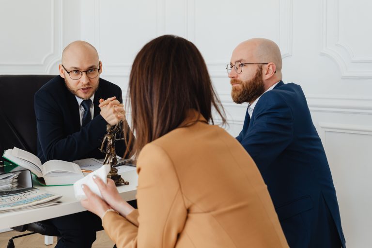 Lawyers in a modern office discussing a legal matter